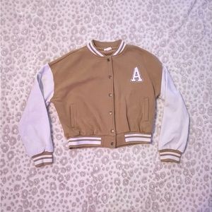 White and cream varsity jacket
